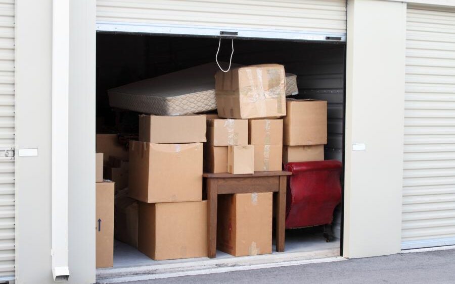 Self storage unit organized with moving boxes